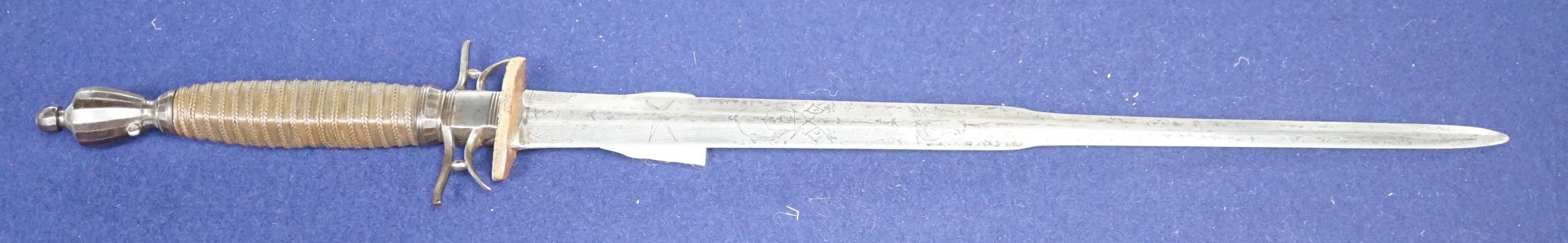 An 18th century German hunting hangar, etched blade. Total length 56.5cm